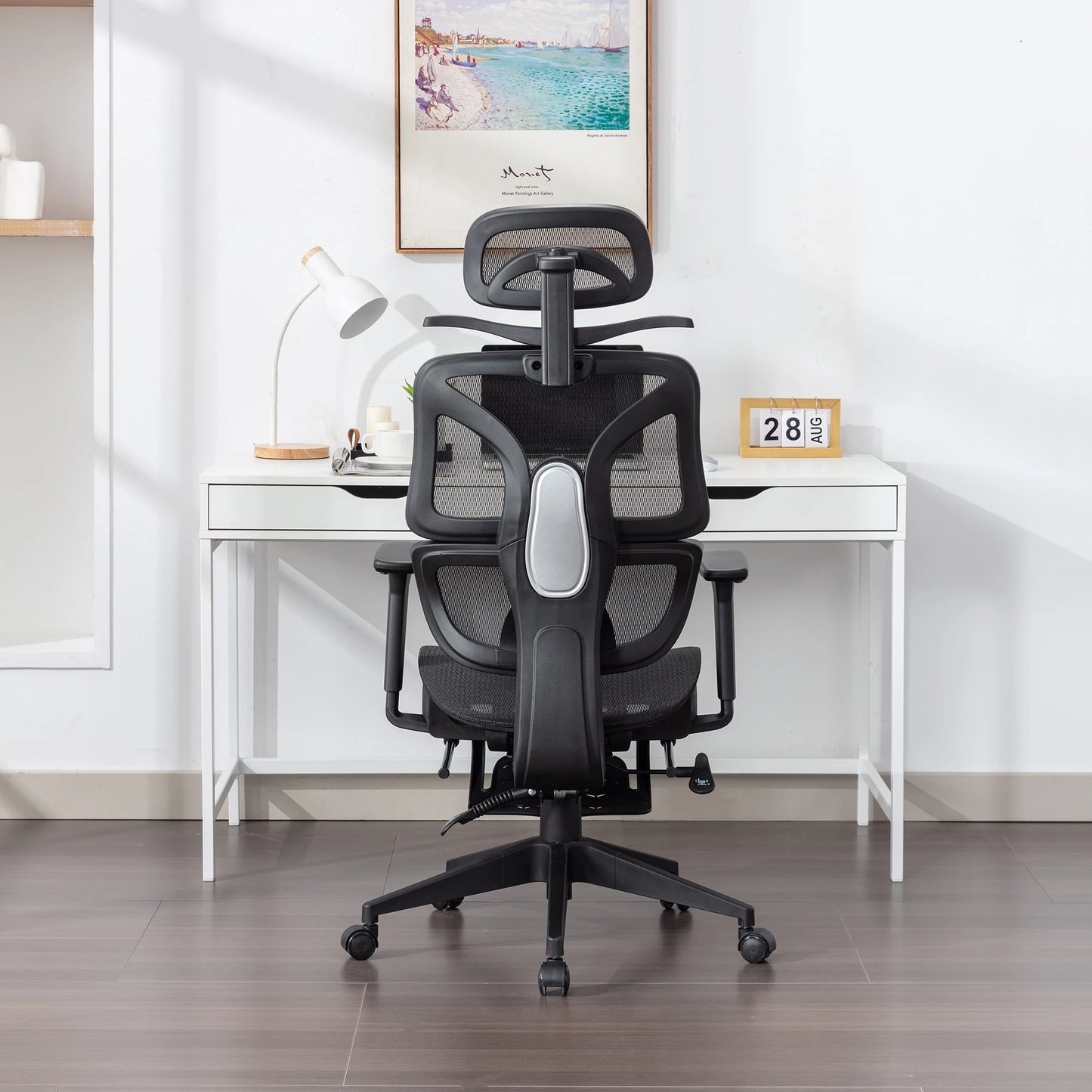 Ergonomic Mesh Office Chair with Lumbar Support, Adjustable Headrest, and Retractable Footrest